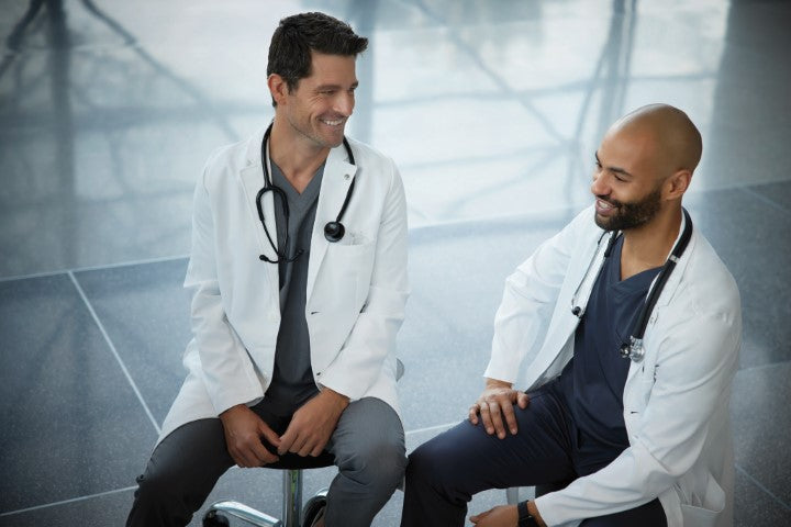 The Evolution of Medical Uniforms: From White Coats to Colorful Scrubs ...